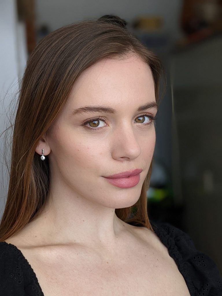 Close-up of professional model with hair and makeup by Bristol makeup artist Evie Smith.
