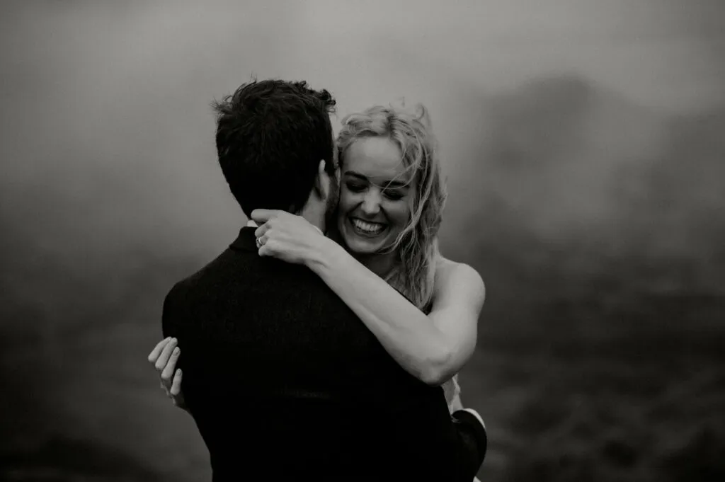 Black and white photo of newly married couple and bride's makeup