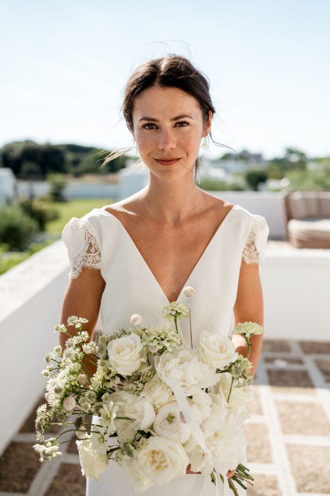 Bride at her destination wedding in Puglia with makeup by Bristol makeup artist, Evie Smith
