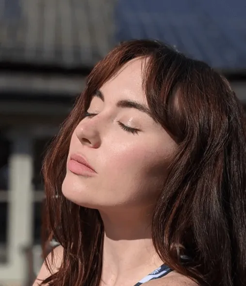 Close-up of model with professional hair and makeup by Bristol makeup artist Evie Smith.