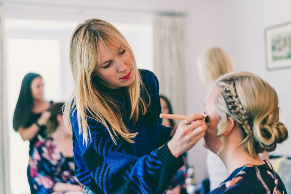 Bristol makeup artist Evie Smith applying makeup bride on her wedding day.