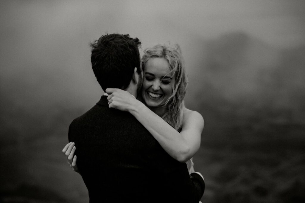 Black and white photo of newly married couple and bride's makeup
