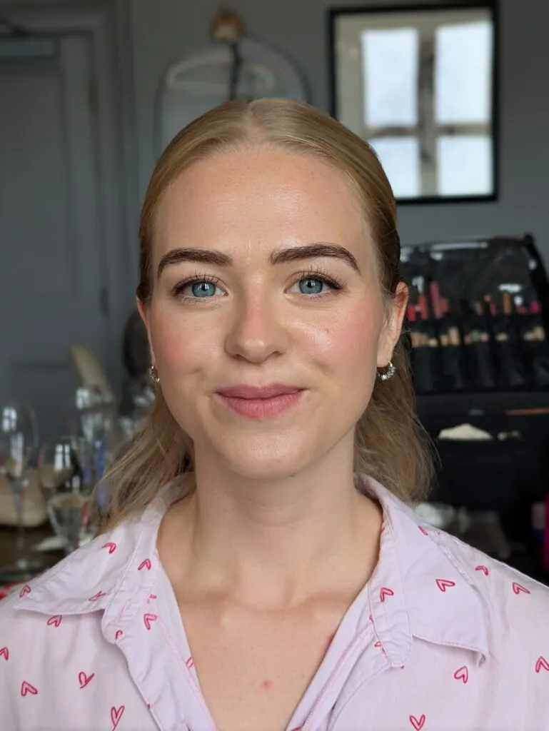 blonde bride at clevedon hall looking directly into the camera after having her hair and makeup done by a bristol makeup artist