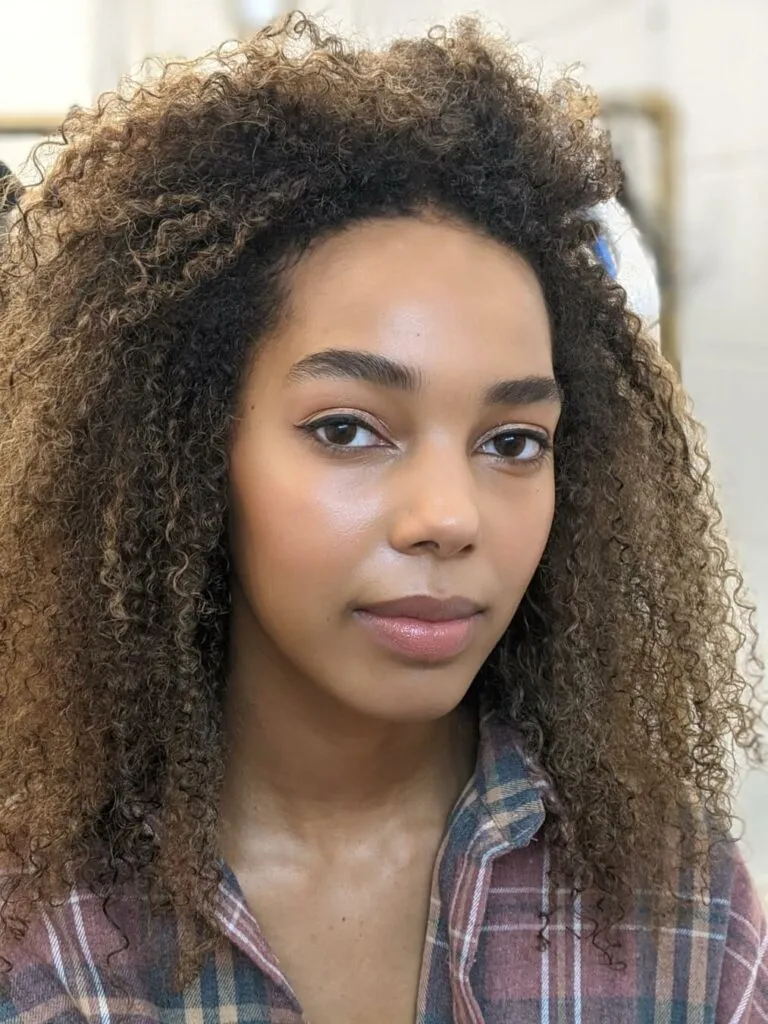 Close-up of professional model with hair and makeup by Bristol makeup artist Evie Smith.