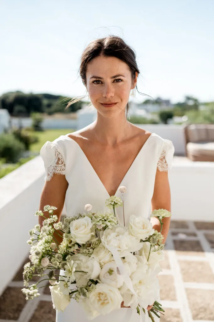 Bride at her destination wedding in Puglia with makeup by Bristol makeup artist, Evie Smith