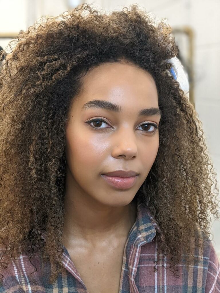 Close-up of professional model with hair and makeup by Bristol makeup artist Evie Smith.